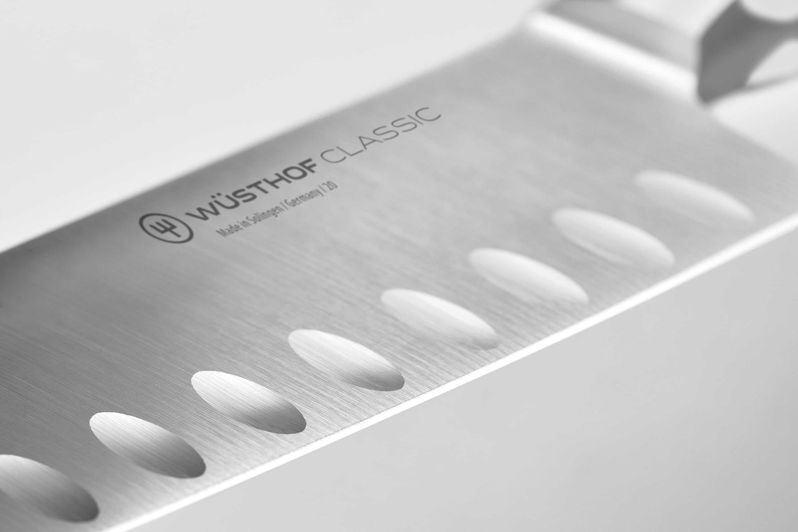 w-sthof-classic-white-5-hollow-ground-santoku-knife-forged-high-carbon-stainless image 2