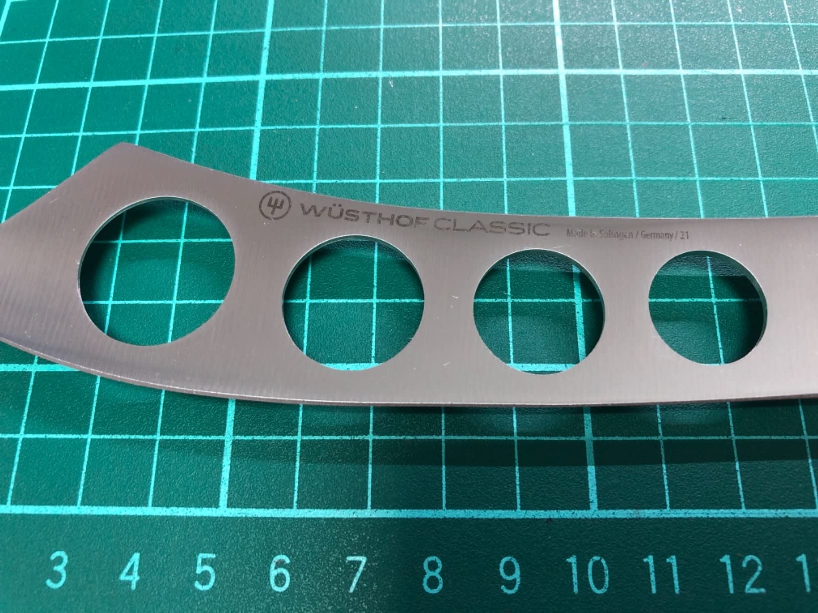 Does exactly what a cheese knife should