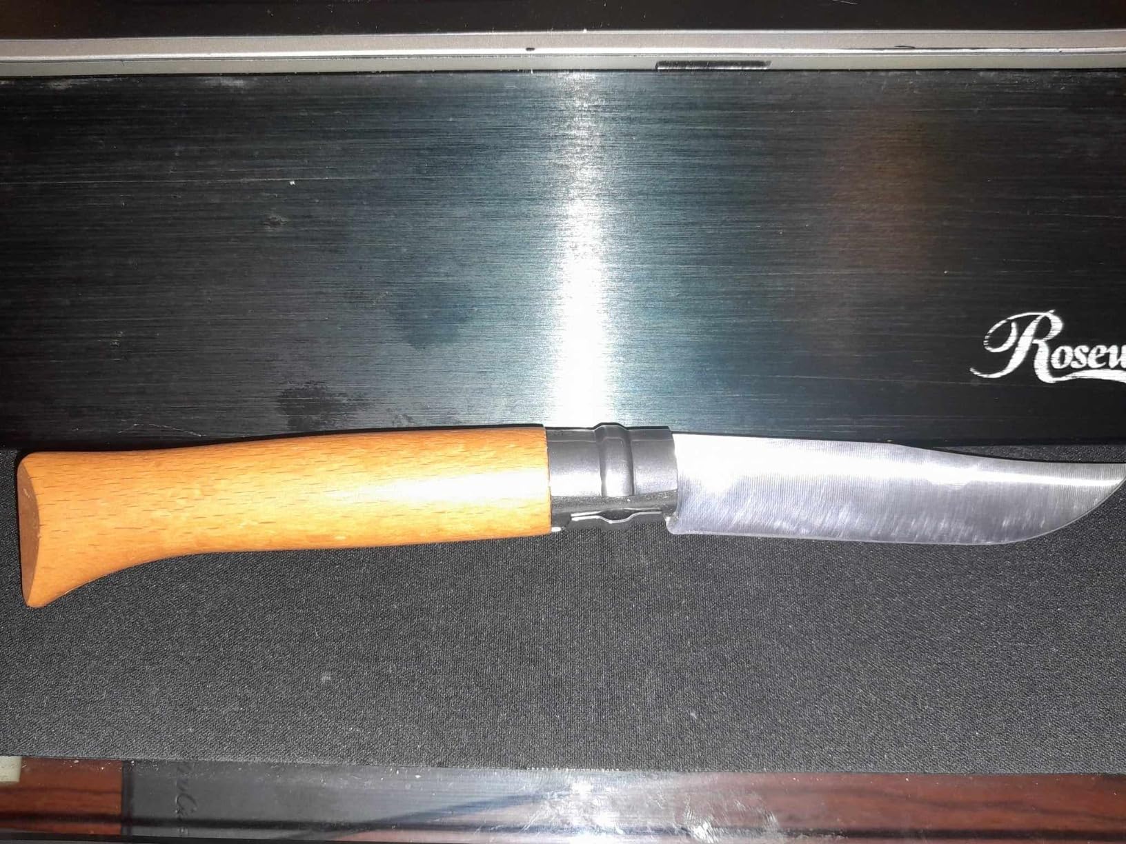 Good knife, tight action at first