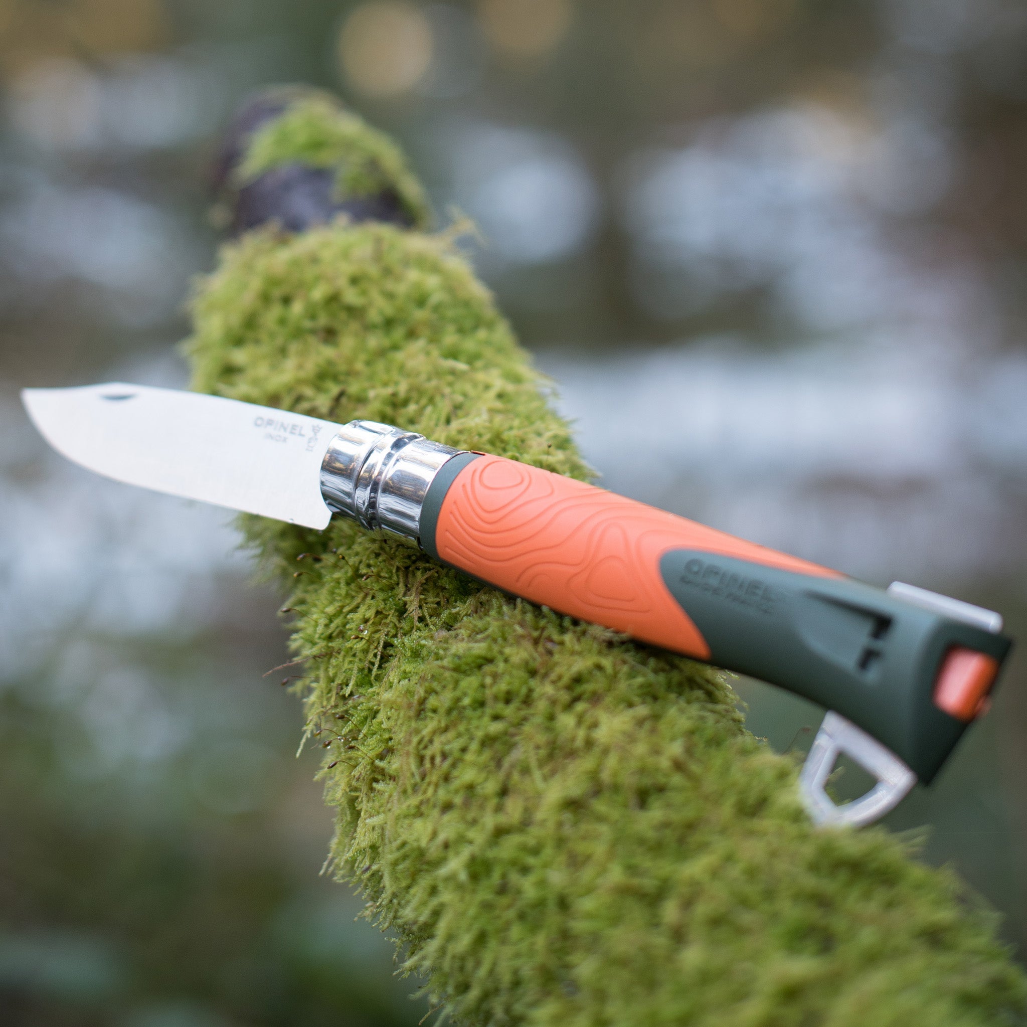 opinel-no-12-outdoor-explore-folding-knife-with-fire-starter-and-whistle-orange image 2